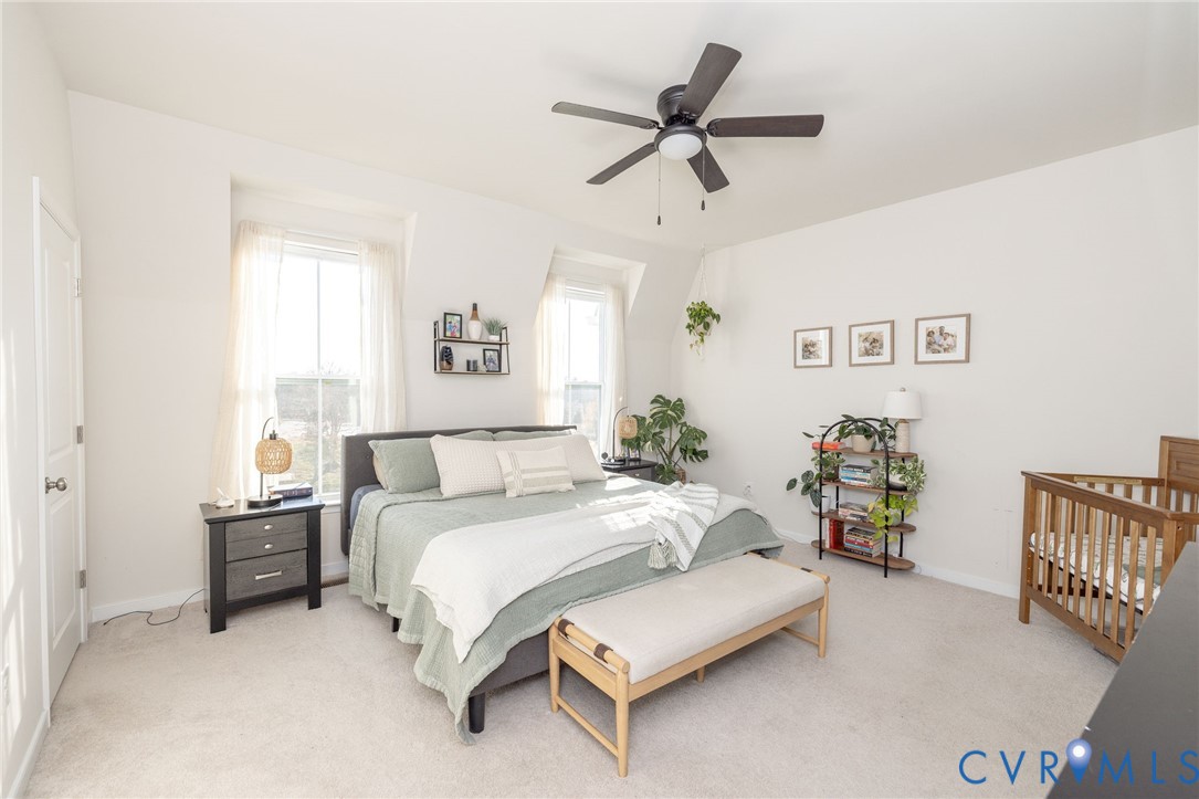 14435 Hancock Towns Drive Chesterfield, VA 23832 - Photo 19 of 34 a bedroom with a bed furniture and a window
