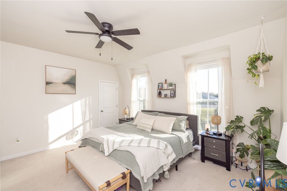14435 Hancock Towns Drive Chesterfield, VA 23832 - Photo 20 of 34 a bedroom with a bed and ceiling fan