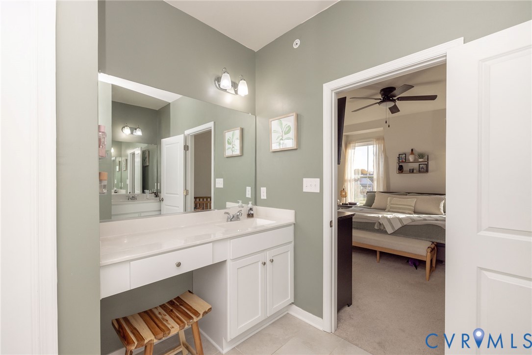 14435 Hancock Towns Drive Chesterfield, VA 23832 - Photo 21 of 34 a en suite bathroom with a sink and a mirror