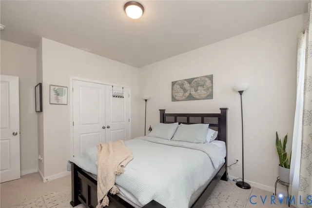 a view of a livingroom with furniture and a flat screen tv