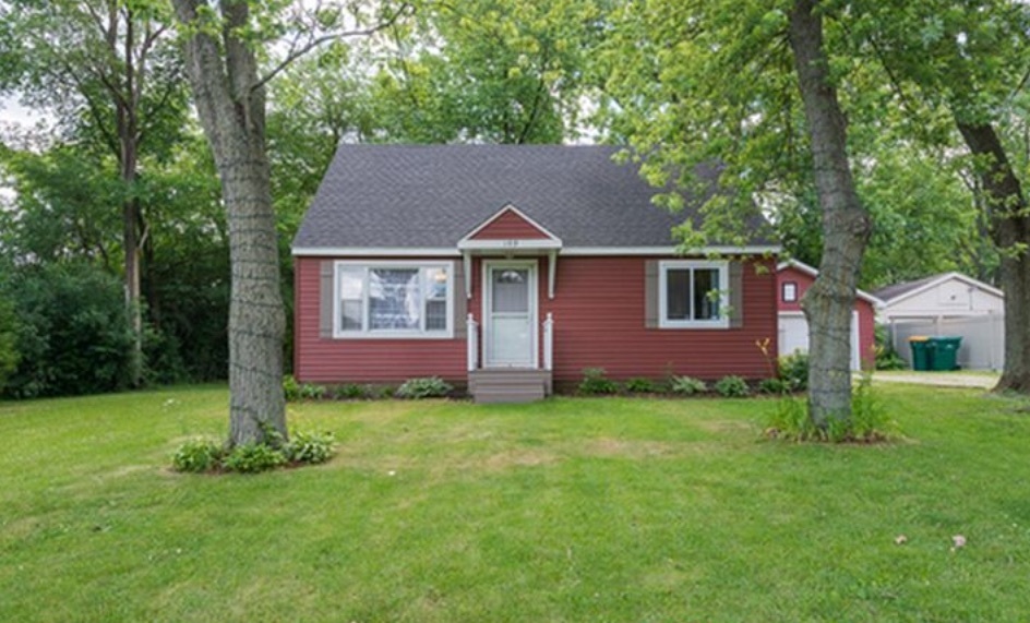 109 Highland Road Willowbrook, IL 60527 - Photo 1 of 18 a front view of a house with a garden