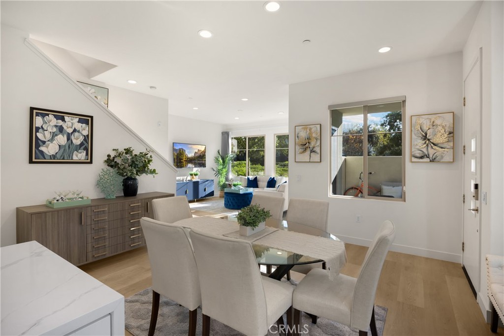 269 Magnet Irvine, CA 92618 - Photo 12 of 61 a view of a dining room with furniture window and wooden floor