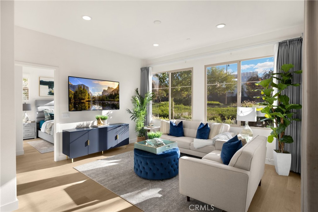 269 Magnet Irvine, CA 92618 - Photo 13 of 61 a living room with furniture and a flat screen tv