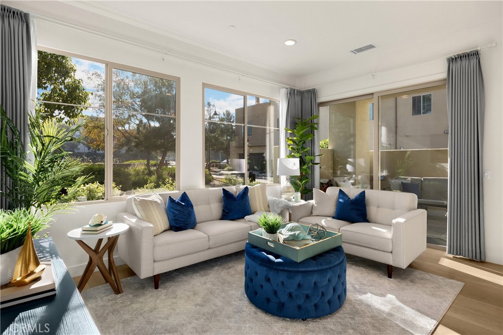 269 Magnet Irvine, CA 92618 - Photo 14 of 61 a living room with furniture and a large window