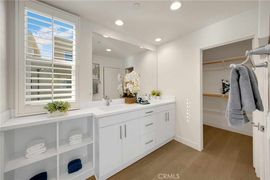 269 Magnet Irvine, CA 92618 - Photo 28 of 61 a bathroom with a double vanity sink and a window