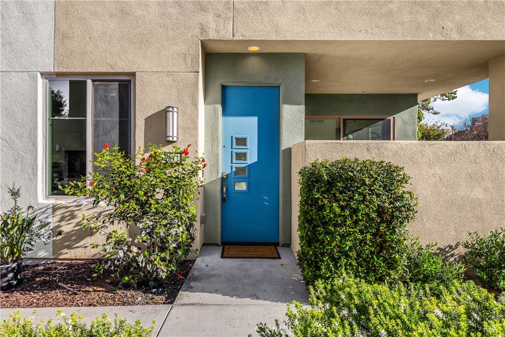 269 Magnet Irvine, CA 92618 - Photo 4 of 61 front view of a house with potted plants