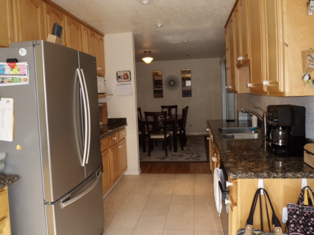 4417 Williams Road San Jose, CA 95129 - Photo 2 of 10 a kitchen with stainless steel appliances granite countertop a refrigerator and a stove