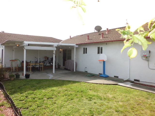 4417 Williams Road San Jose, CA 95129 - Photo 7 of 10 a backyard of a house with table and chairs
