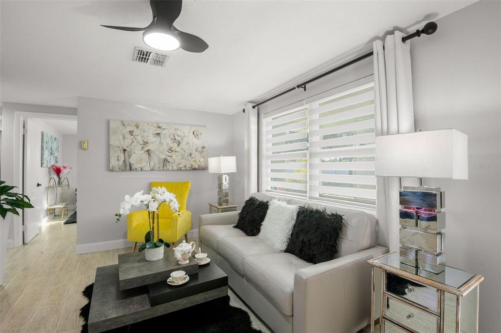 4149 Darlington Road Holiday, FL 34691 - Photo 11 of 34 a living room with furniture and a couch