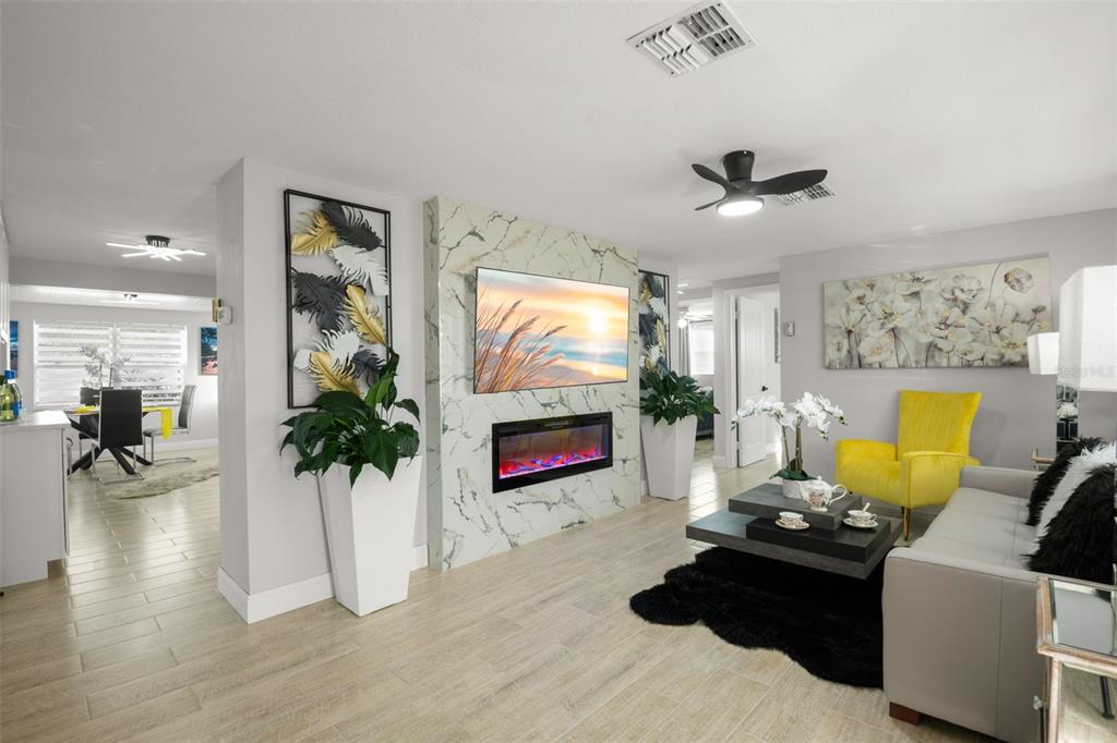 4149 Darlington Road Holiday, FL 34691 - Photo 6 of 34 a living room with furniture and a flat screen tv