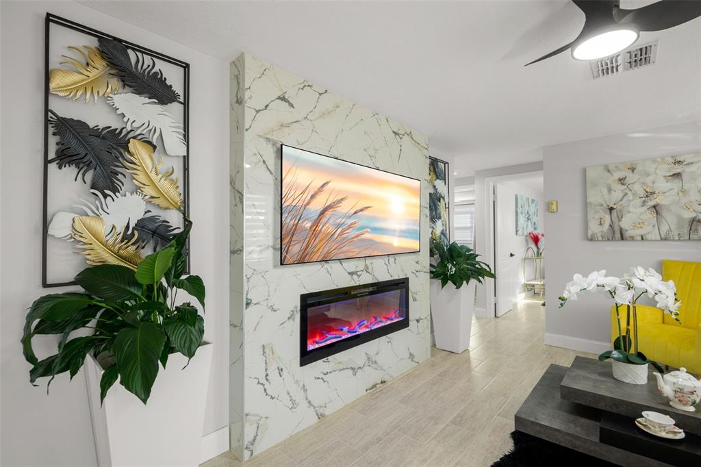 4149 Darlington Road Holiday, FL 34691 - Photo 10 of 34 a living room with furniture and a potted plant