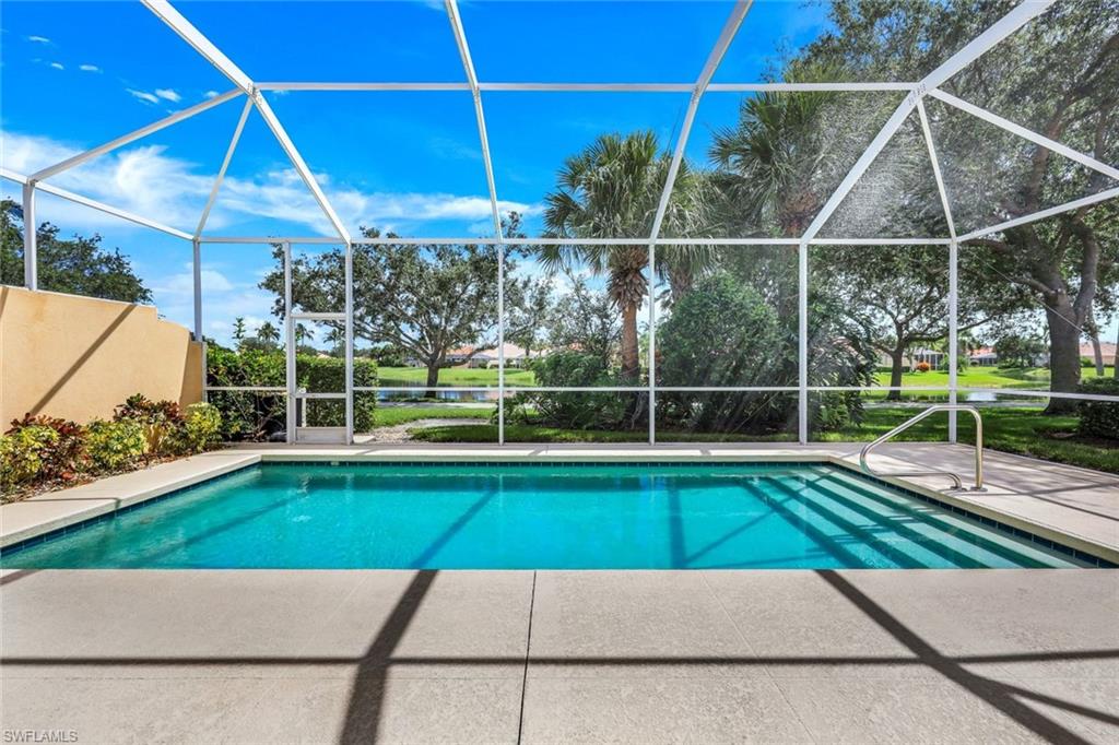 3059 Ellice Way Naples, FL 34119 - Photo 3 of 50 a view of a backyard with a small yard
