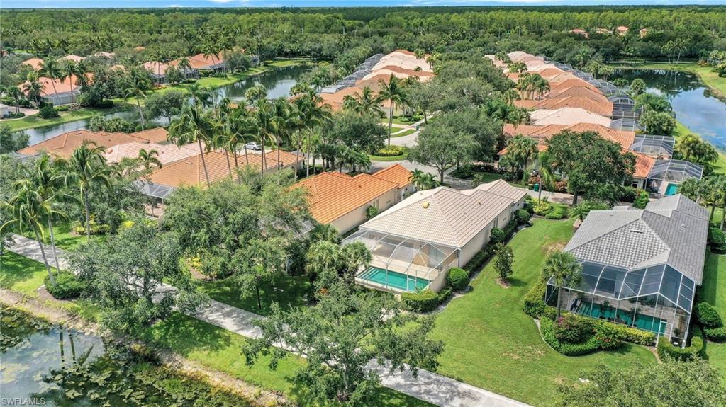 3059 Ellice Way Naples, FL 34119 - Photo 36 of 50 an aerial view of a house with outdoor space and street view