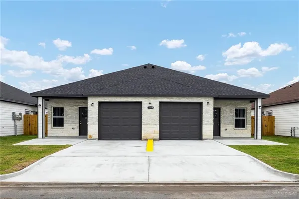 a front view of a house with street