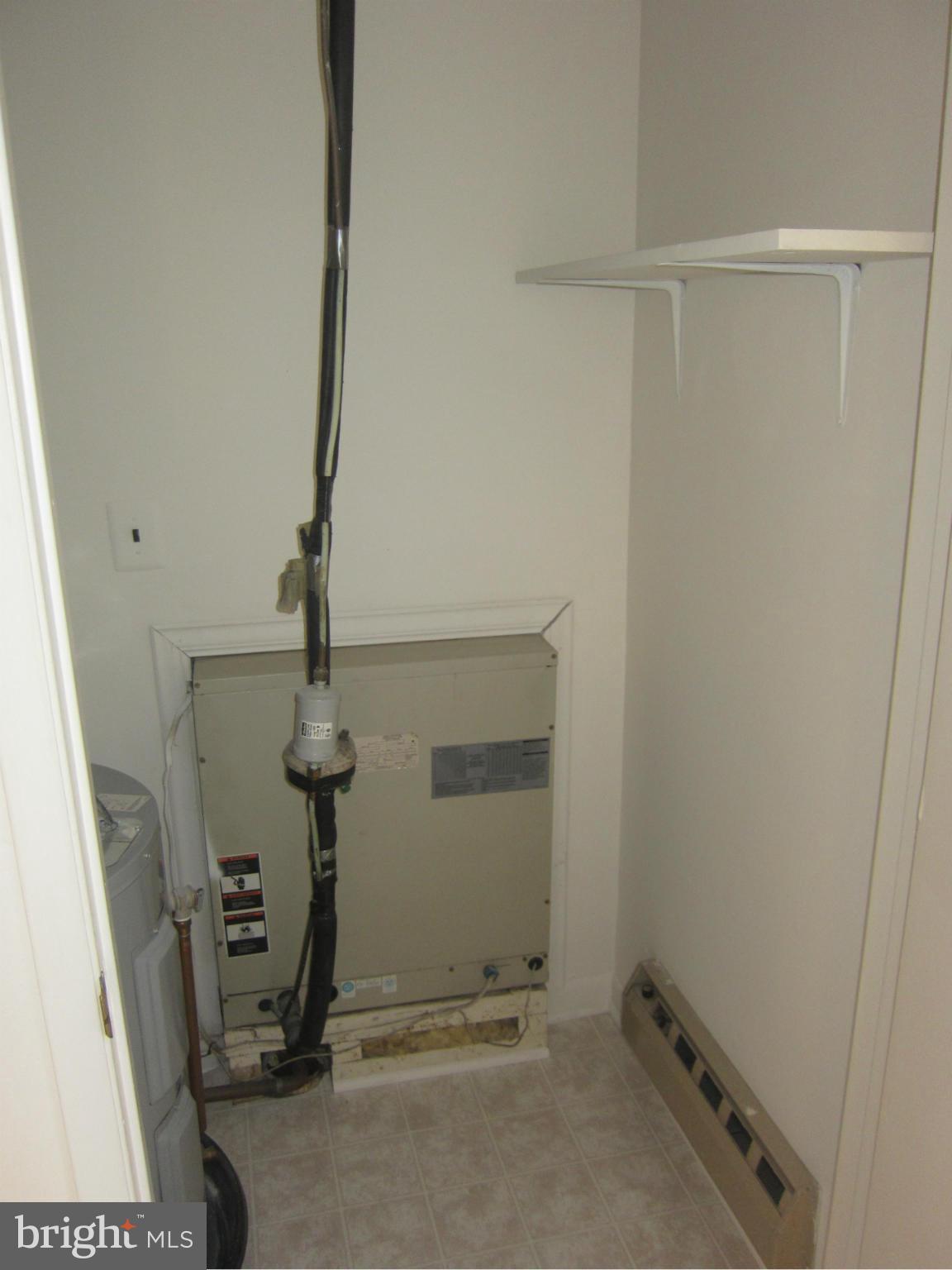 15310 Beaverbrook Court, Unit 891B Silver Spring, MD 20906 - Photo 12 of 26 Utility/storage closet in kitchen