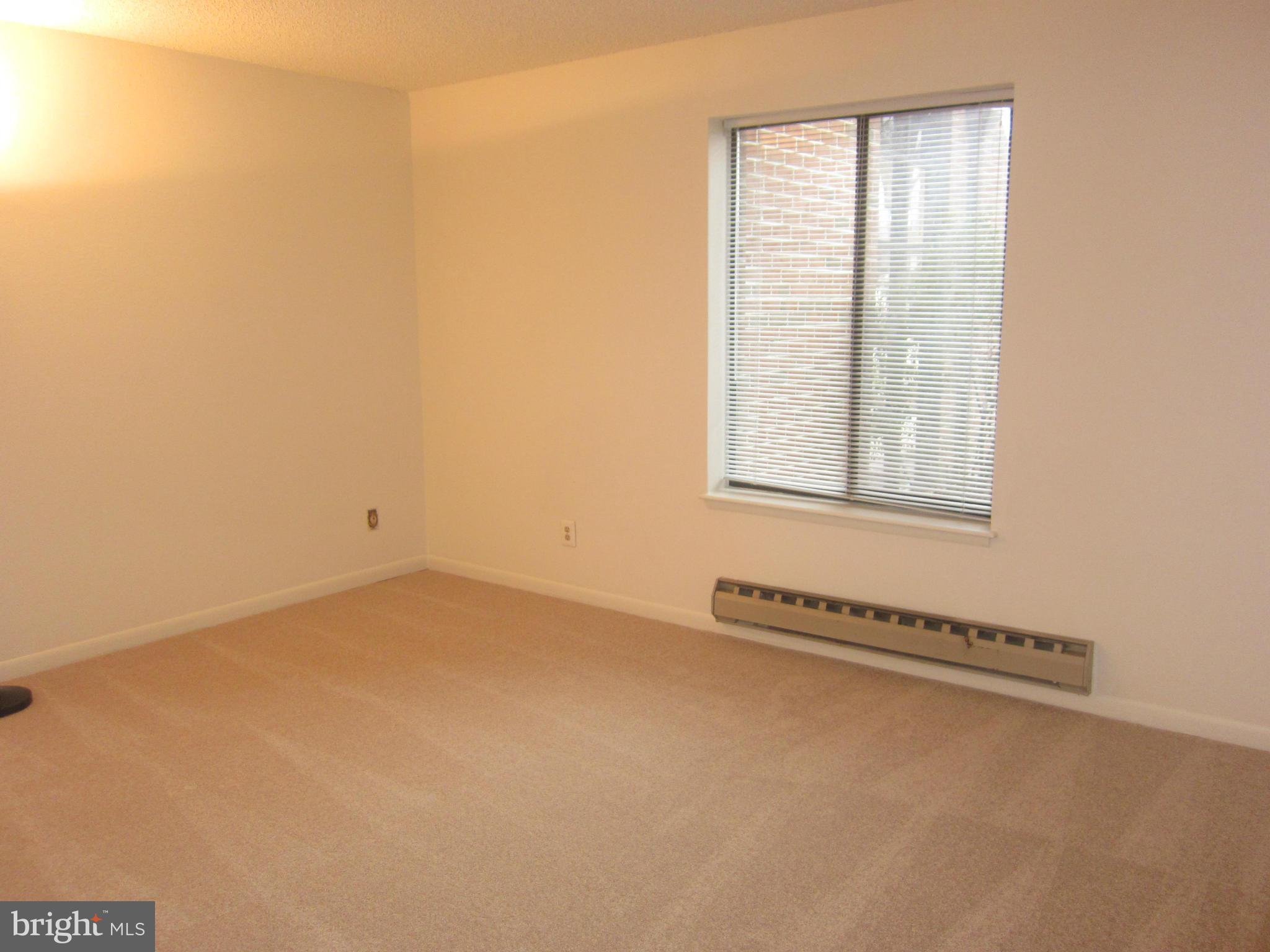 15310 Beaverbrook Court, Unit 891B Silver Spring, MD 20906 - Photo 15 of 26 Bedroom with window facing front