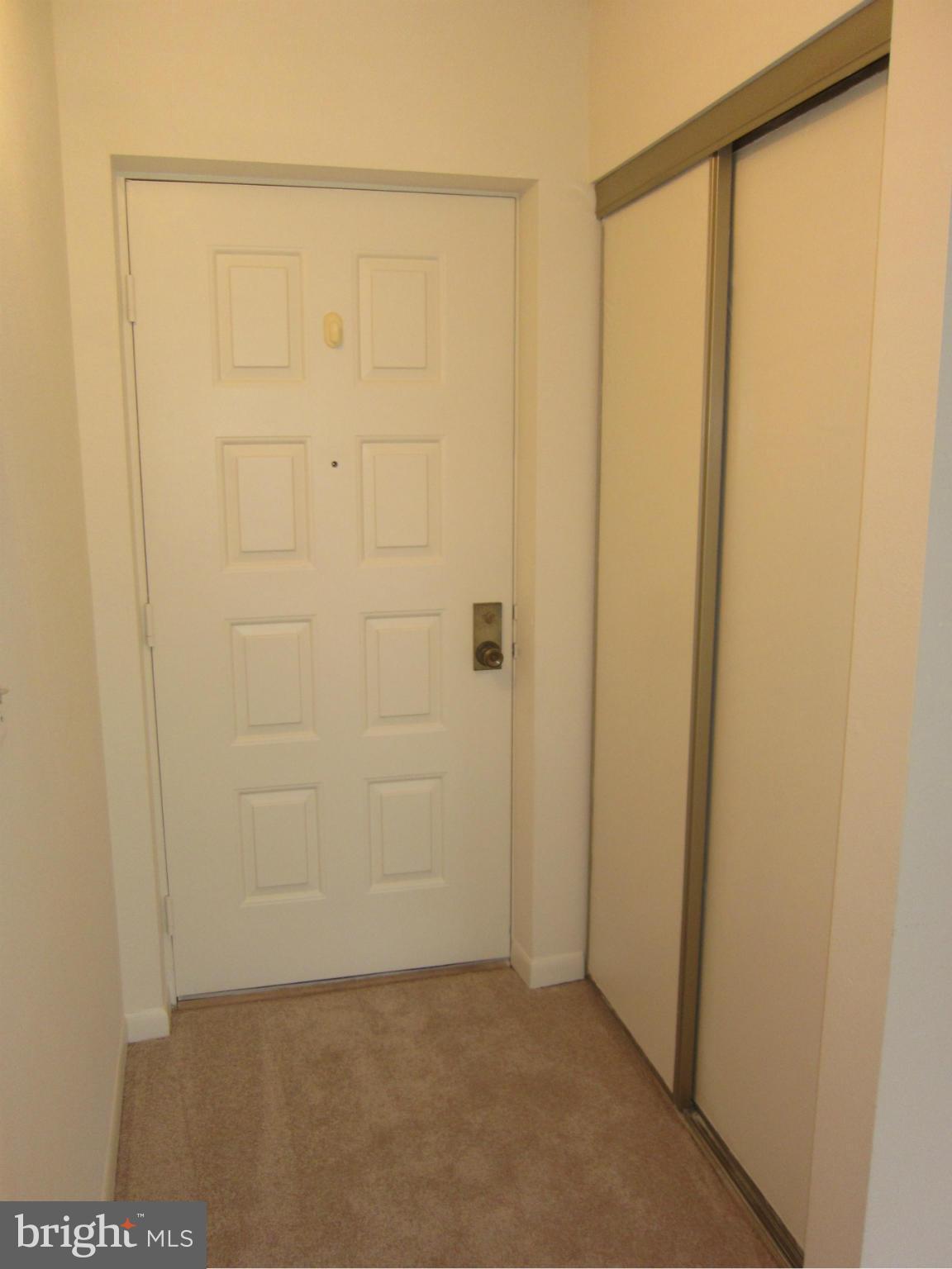 15310 Beaverbrook Court, Unit 891B Silver Spring, MD 20906 - Photo 3 of 26 Hall Entry - Large coat closet