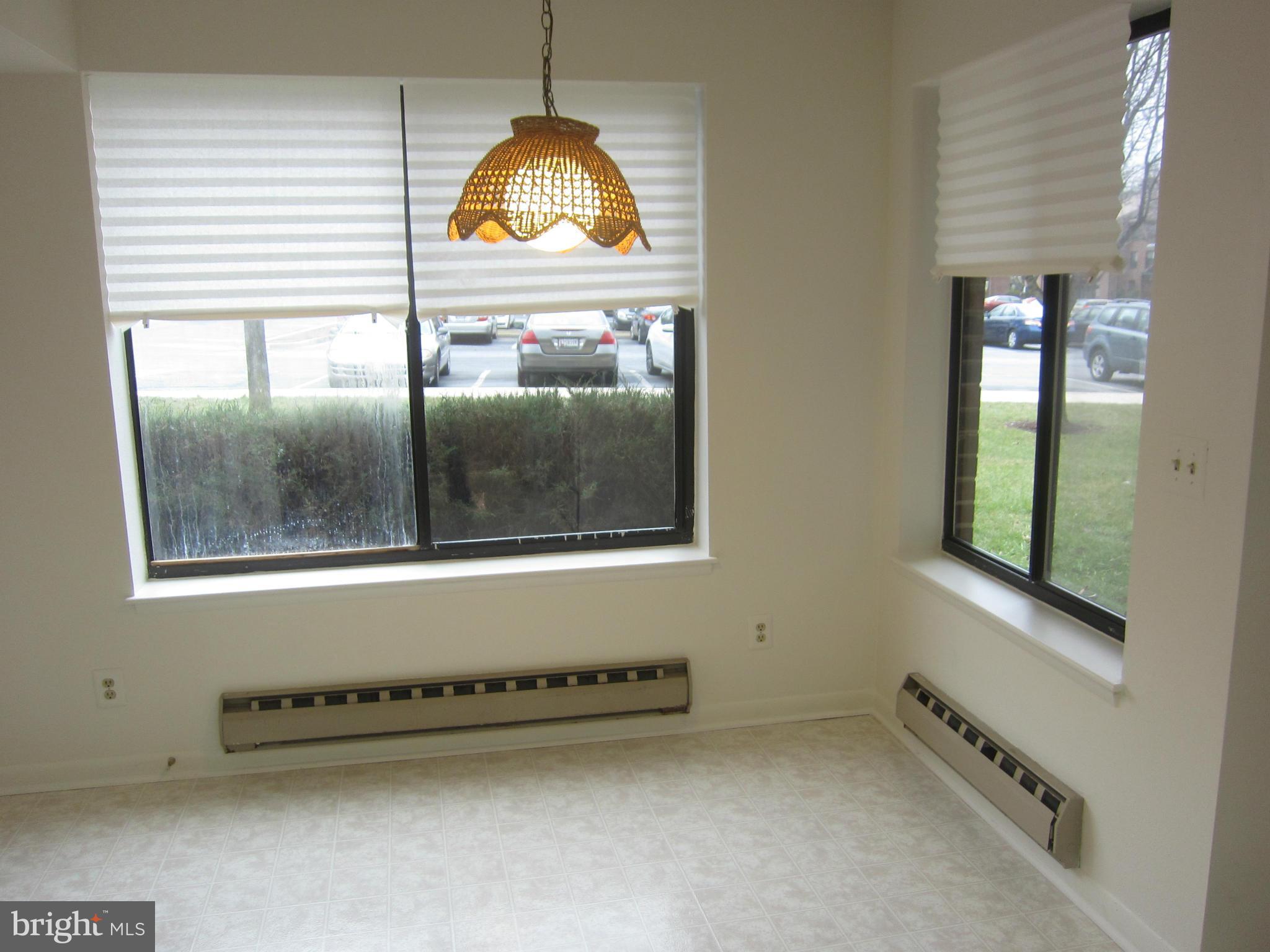 15310 Beaverbrook Court, Unit 891B Silver Spring, MD 20906 - Photo 10 of 26 Kitchen eat-in area, view of front