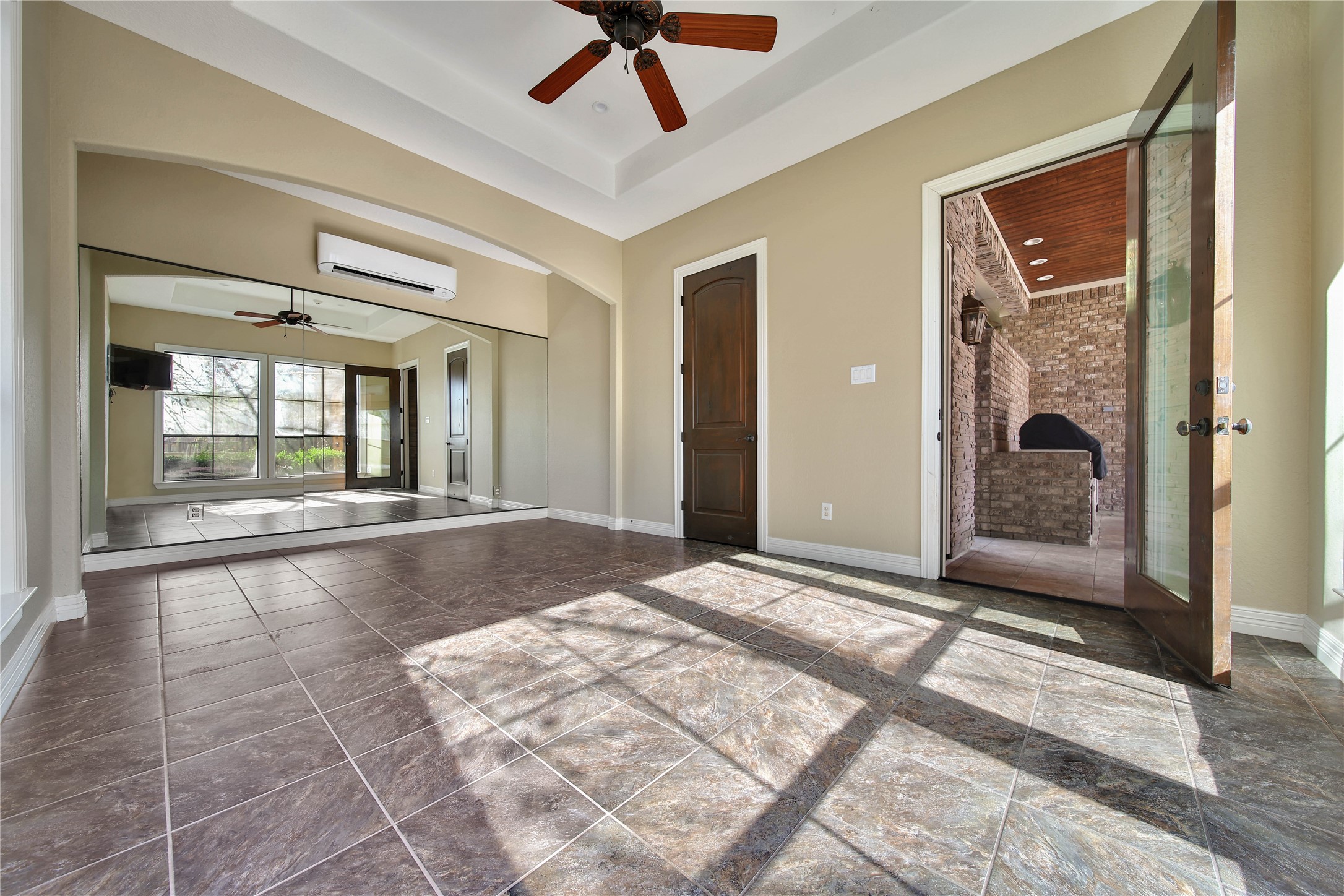 6803 Star Ledge Court Spring, TX 77389 - Photo 35 of 48 Another view of the pool room - offering easy access to the covered patio area, outdoor kitchen, and the other door leads to the full bath which is also accessible from the patio area