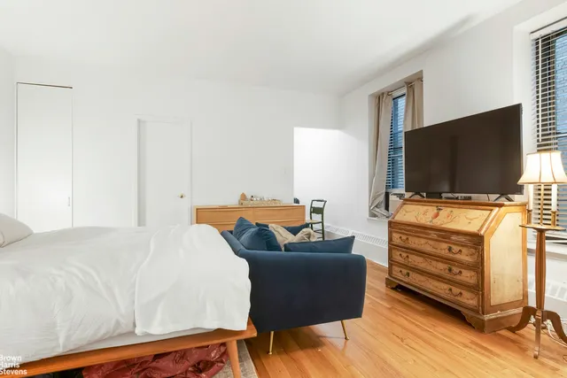 a kitchen with stainless steel appliances a stove and a refrigerator