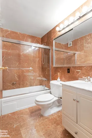 a kitchen with stainless steel appliances a stove and a refrigerator