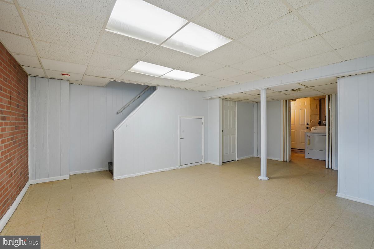 162 Cherrydell Road Baltimore, MD 21228 - Photo 26 of 31 Spacious basement with versatile potential.