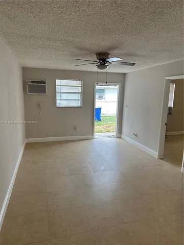 a view of a hallway with a chandelier