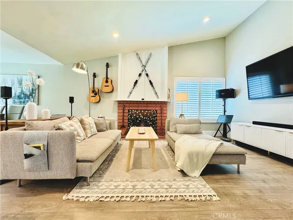 a living room with a couch and a flat screen tv