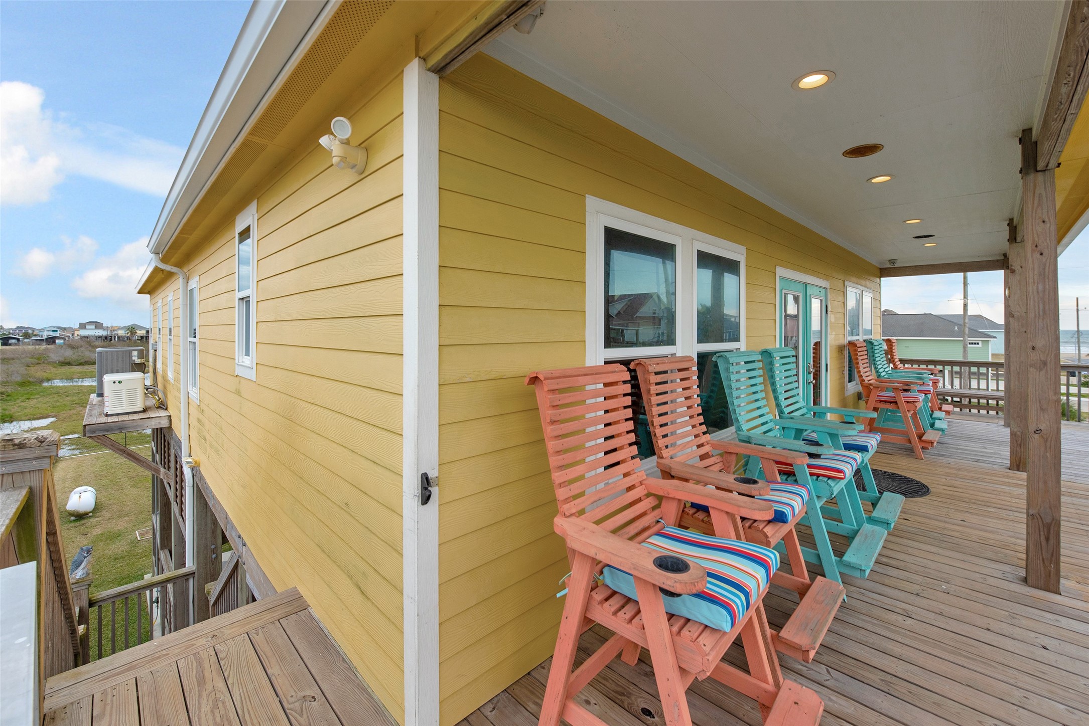 858 South East Road Crystal Beach, TX 77650 - Photo 21 of 44 a balcony view with a seating space