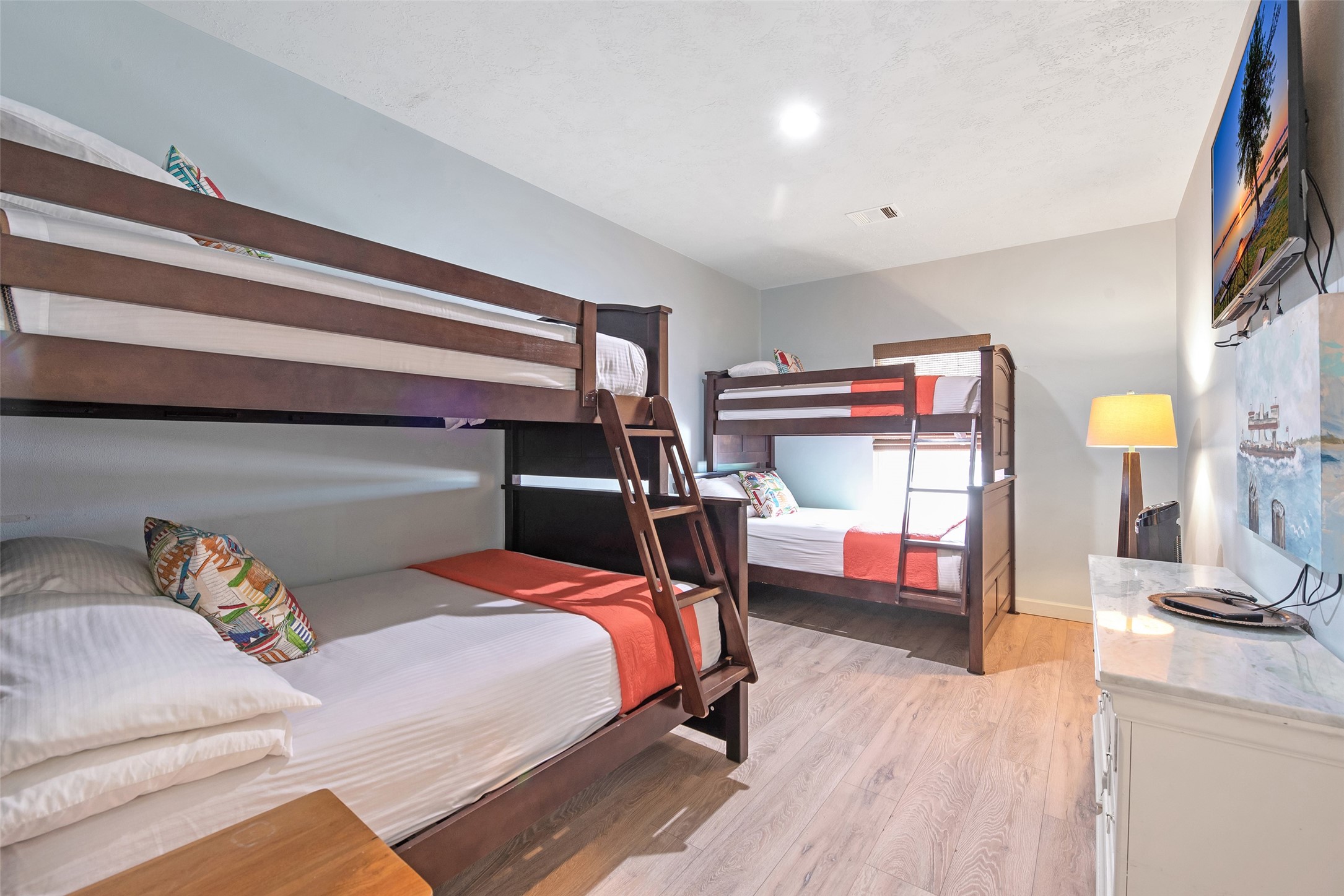 858 South East Road Crystal Beach, TX 77650 - Photo 35 of 44 a bed room with a bed and a television