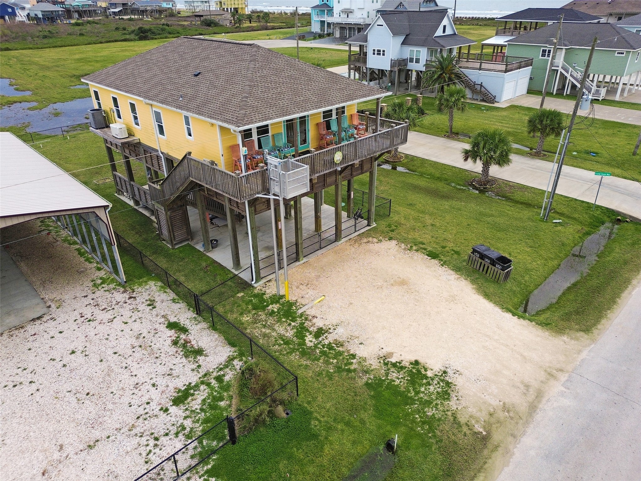858 South East Road Crystal Beach, TX 77650 - Photo 8 of 44 an aerial view of houses with a yard