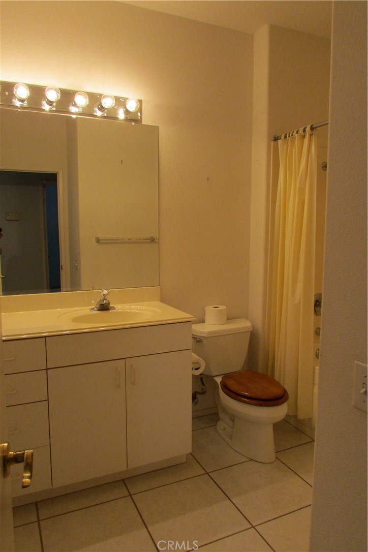 78281 Bovee Circle Palm Desert, CA 92211 - Photo 25 of 38 a bathroom with a sink and a toilet