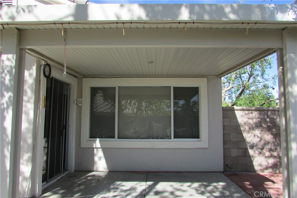 78281 Bovee Circle Palm Desert, CA 92211 - Photo 28 of 38 a living room with a couch and a table