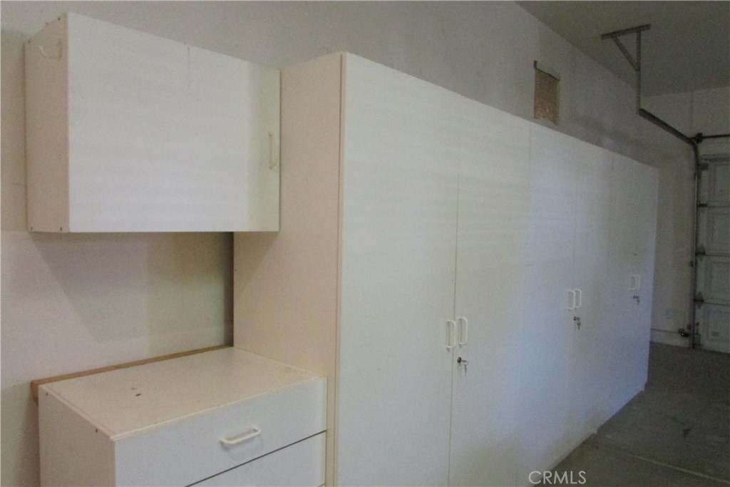 78281 Bovee Circle Palm Desert, CA 92211 - Photo 35 of 38 a utility room with dryer and washer