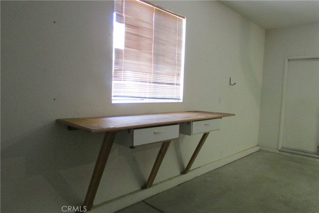 78281 Bovee Circle Palm Desert, CA 92211 - Photo 36 of 38 a balcony with table and window