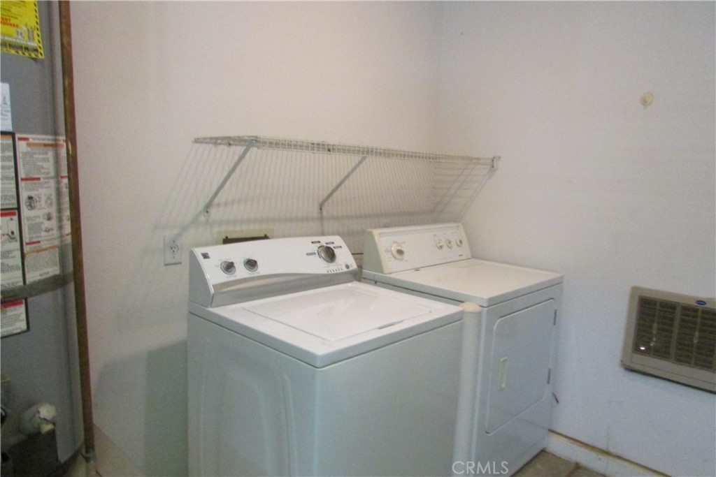 78281 Bovee Circle Palm Desert, CA 92211 - Photo 38 of 38 a utility room with dryer and washer