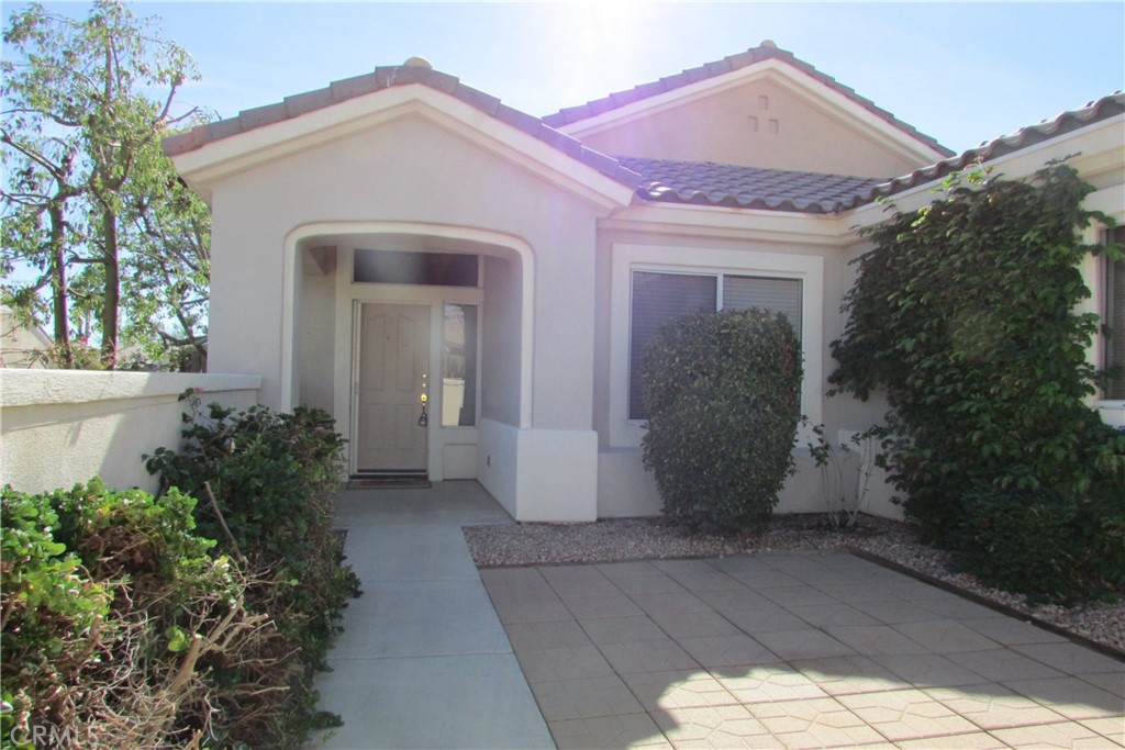 78281 Bovee Circle Palm Desert, CA 92211 - Photo 5 of 38 a view of a house with a yard