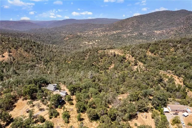 a view of a houses with a yard