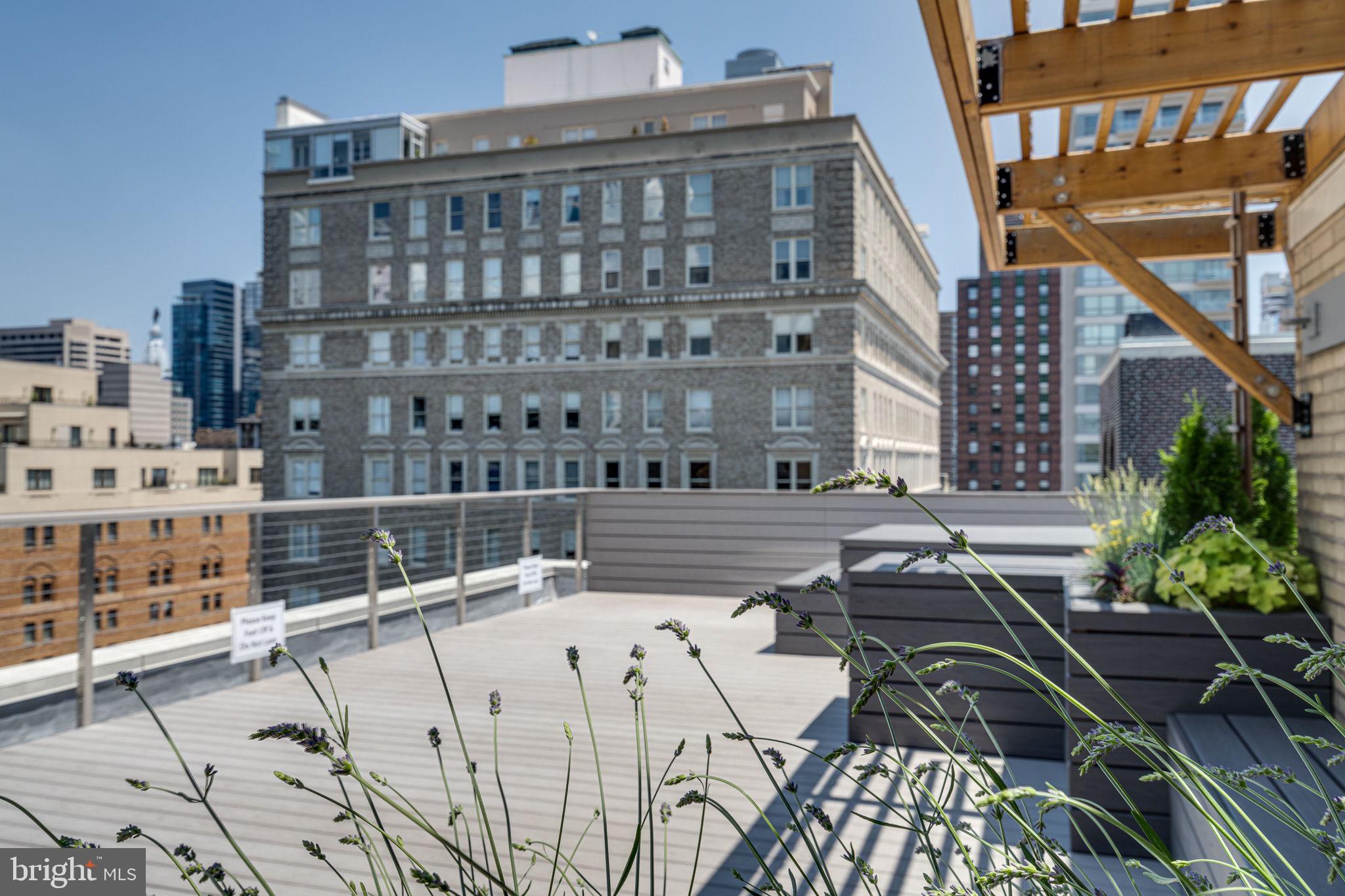1806 Rittenhouse Square, Unit 905 Philadelphia, PA 19103 - Photo 18 of 24 Urban rooftop retreat with skyline views.