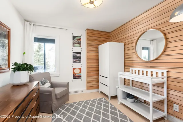 a bedroom with a bed and a cabinets