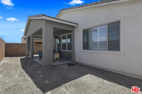 a house view with a outdoor space