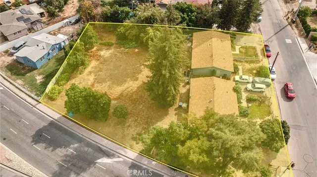 an aerial view of residential building and sign board