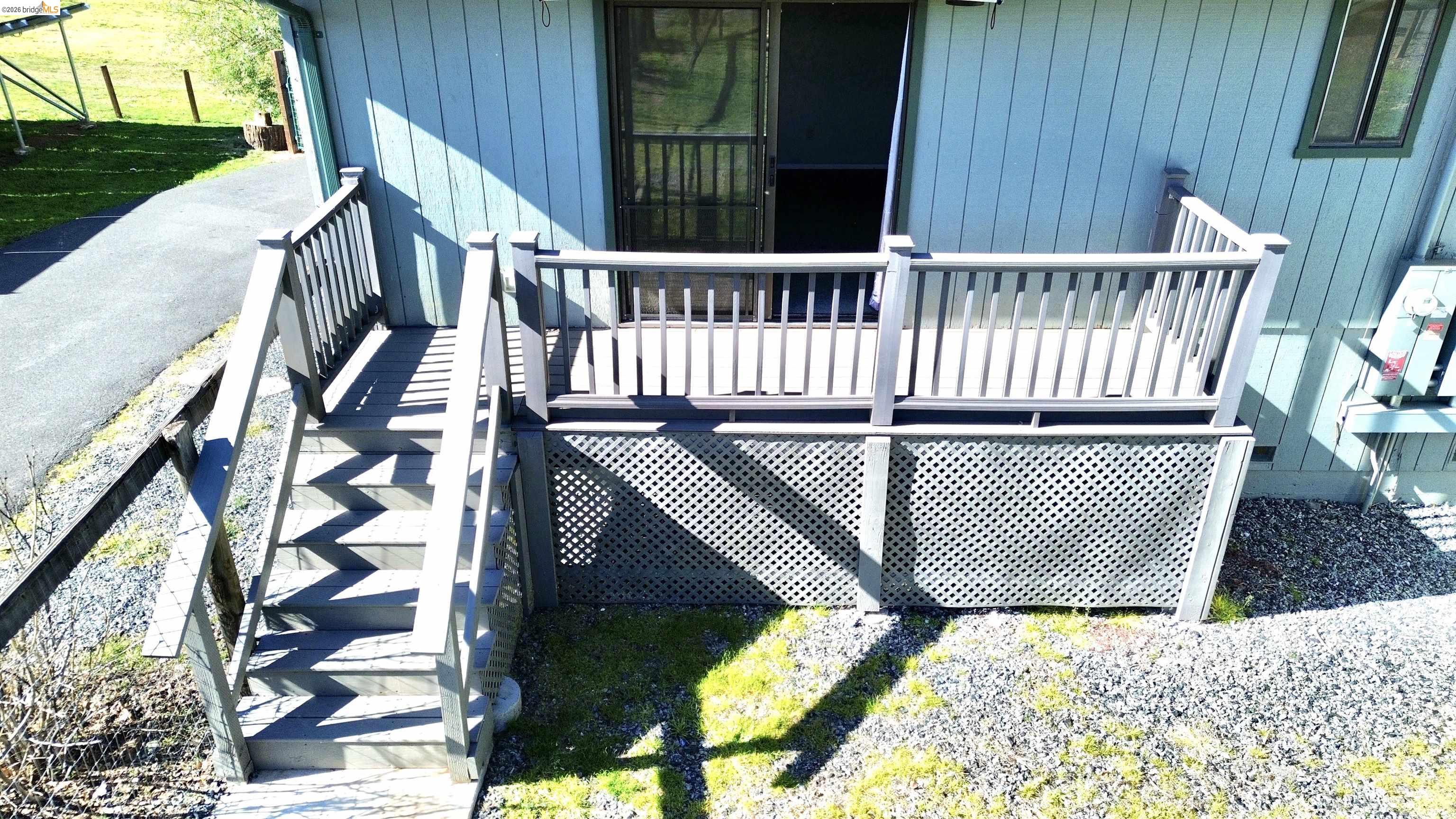 13033 Clements Road Groveland, CA 95321 - Photo 16 of 23 Wooden deck with stairway connected to master room