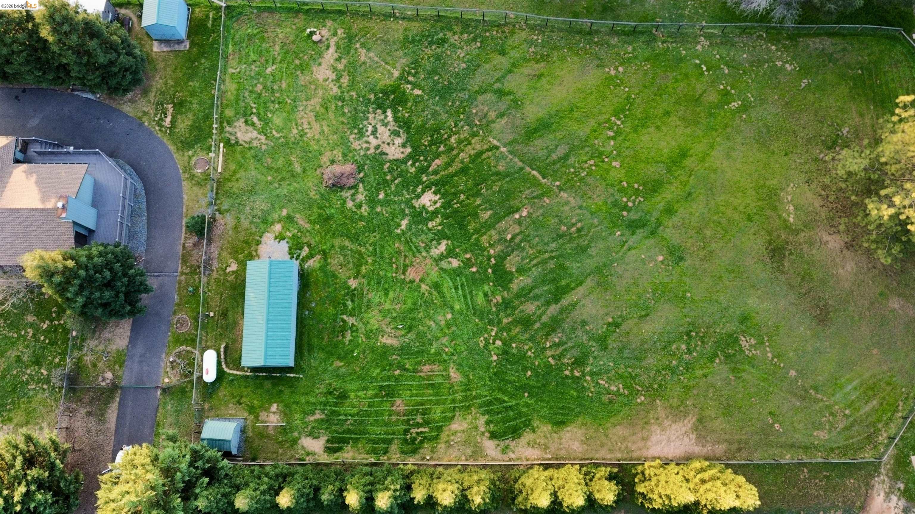 13033 Clements Road Groveland, CA 95321 - Photo 4 of 23 aerial view of pasture with watering ports