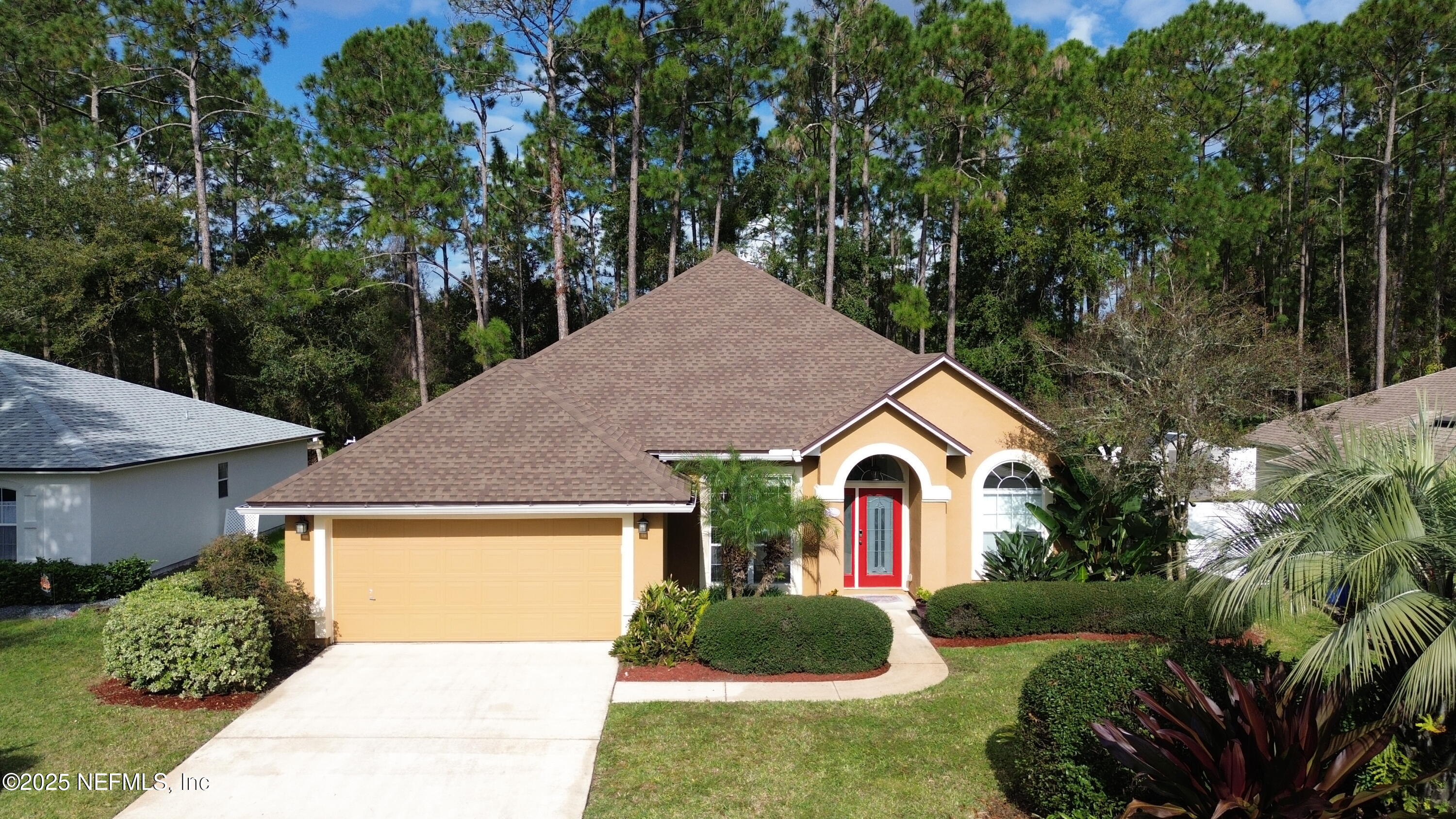 1140 Eddystone Lane Ponte Vedra, FL 32081 - Photo 1 of 29 a front view of a house with garden