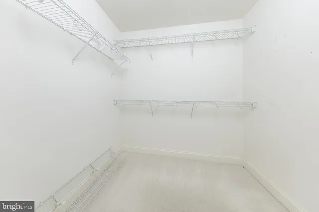 a view of an empty walk in closet