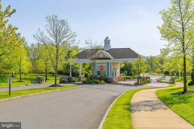 a view of outdoor space with garden and trees