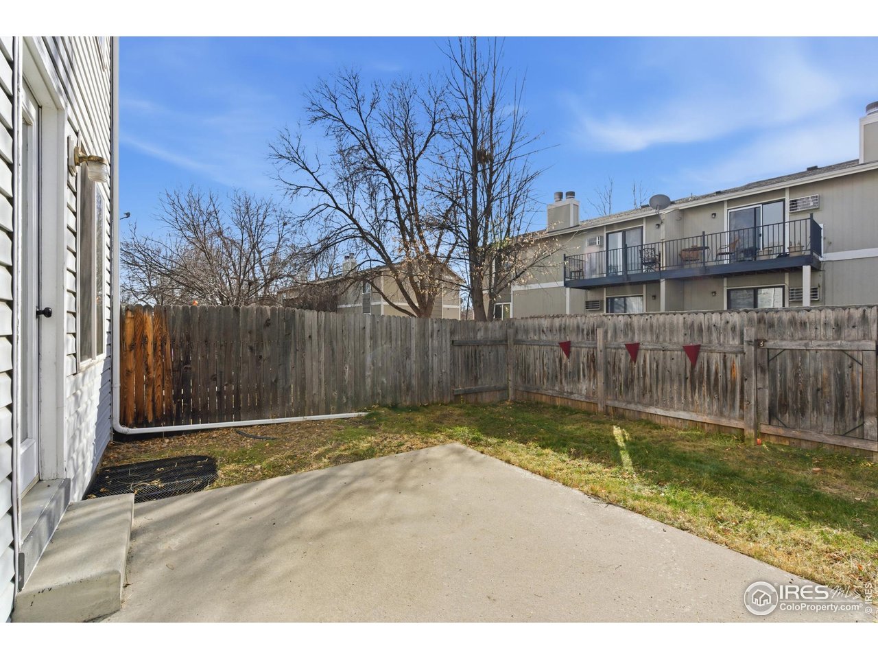 357 Albion Way, Unit 4 Fort Collins, CO 80526 - Photo 26 of 28 a view of wooden fence