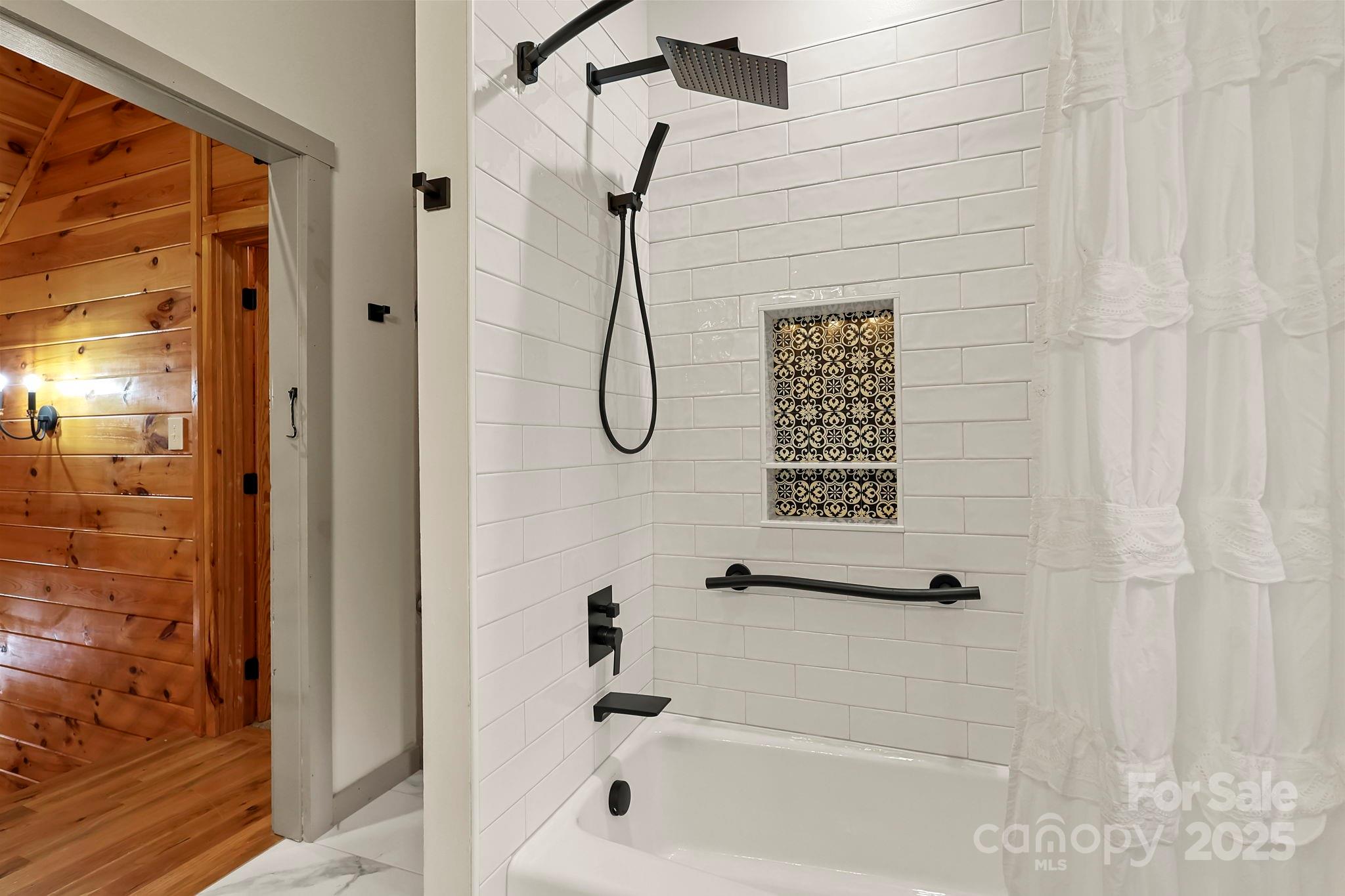 228 Woodby Ridge Road Vilas, NC 28692 - Photo 32 of 46 a bathroom with a shower