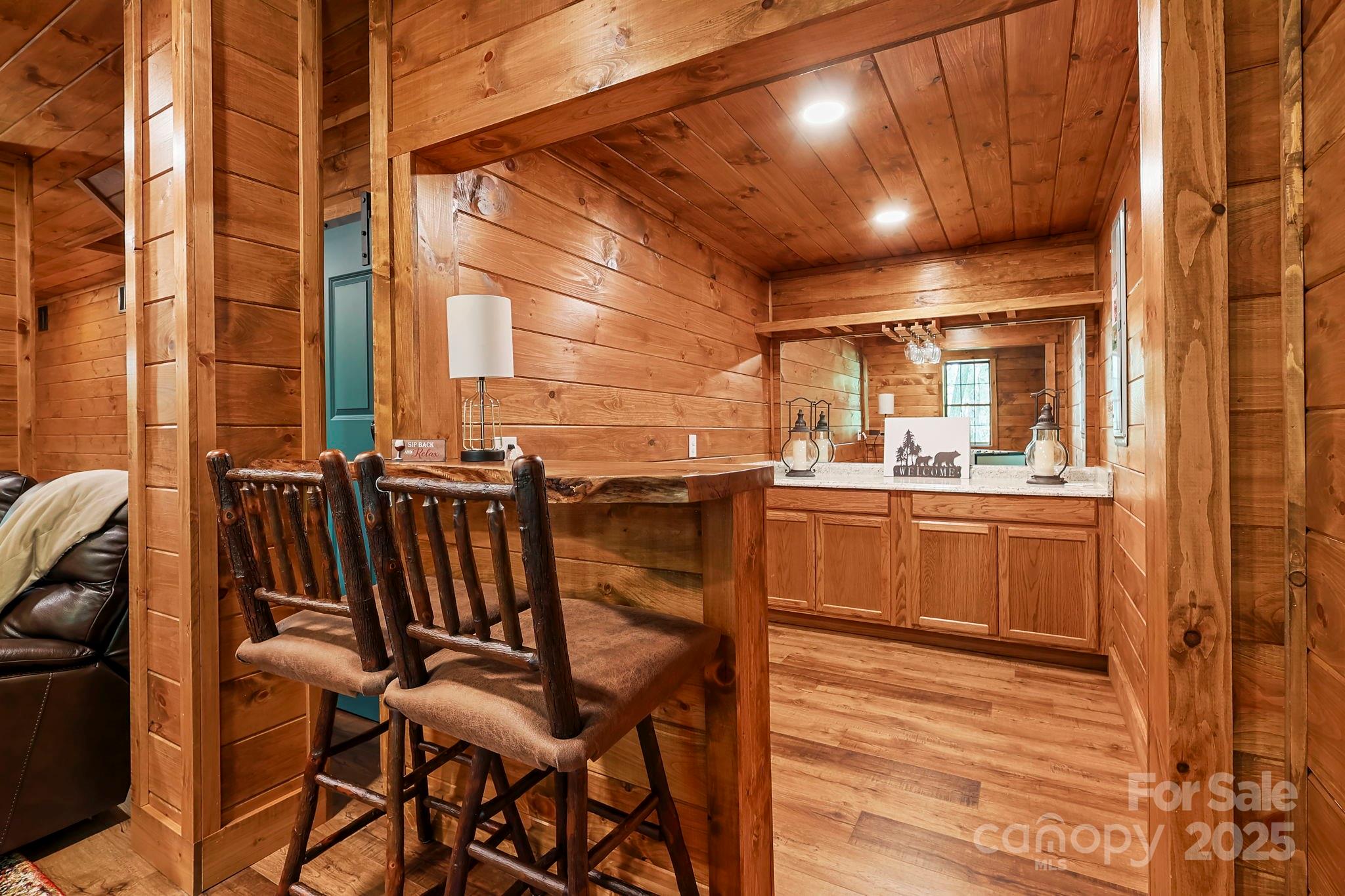 228 Woodby Ridge Road Vilas, NC 28692 - Photo 38 of 46 a view of a chairs and table in a room